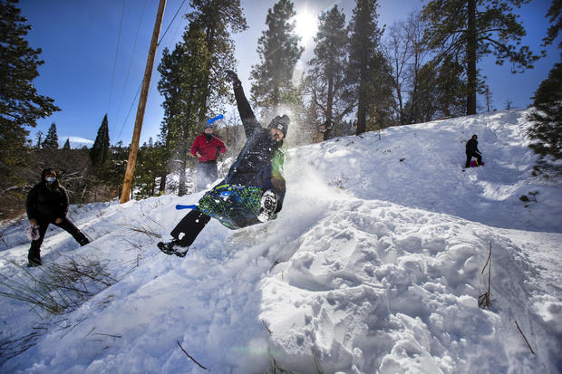 SoCal residents play in the snow from recent storms 