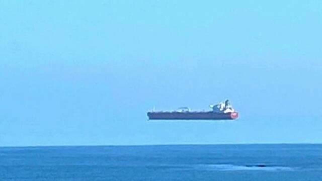 Photos Appear To Show A Giant Ship Hovering Over The Water Off The English Coast Cbs News