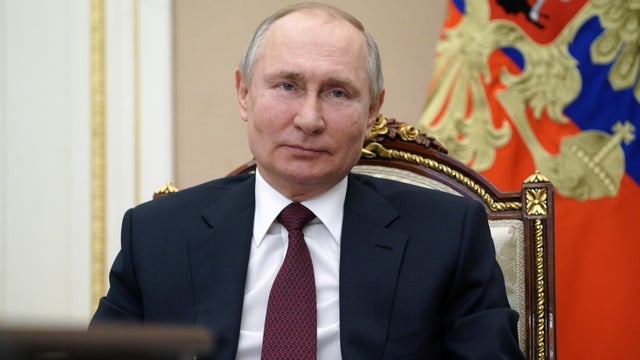 Russian President Vladimir Putin takes part in a video conference in Moscow 