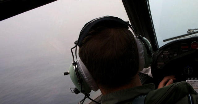 Bad weather delays the hunt for Flight 370