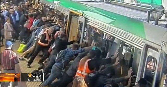 Australian commuters help free man wedged between train car and platform