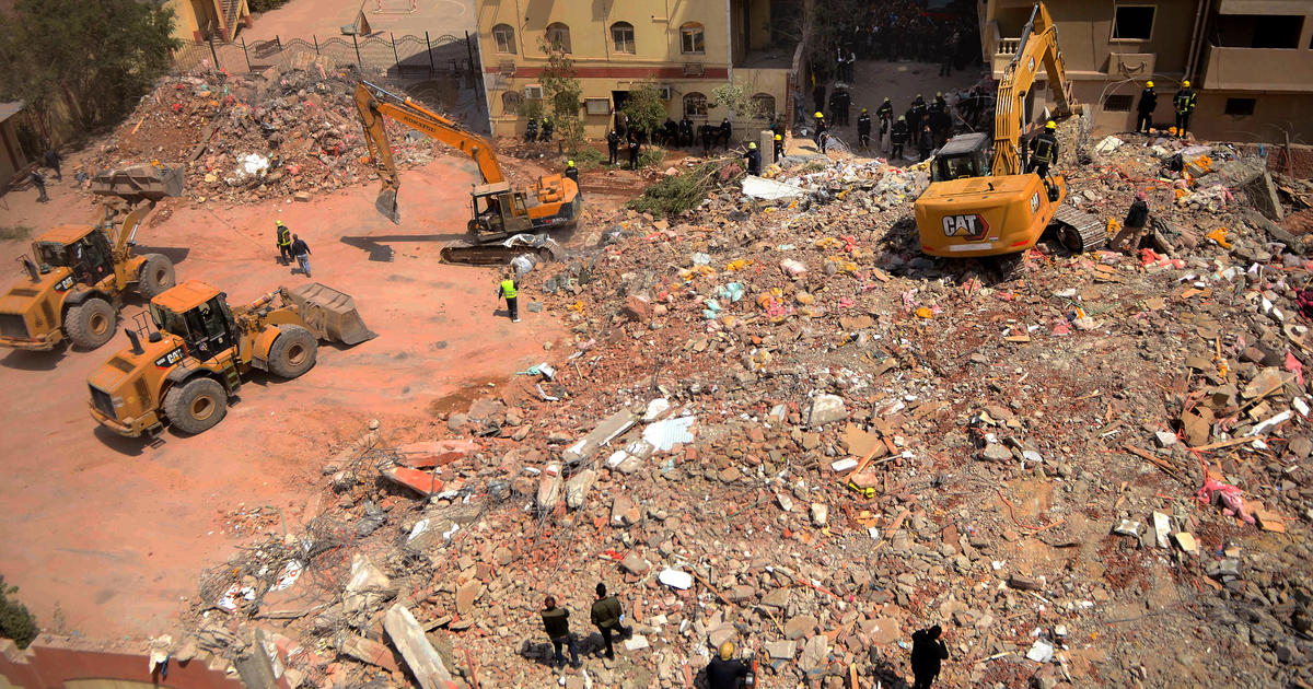 Baby found alive after building collapses in Egypt, killing 25