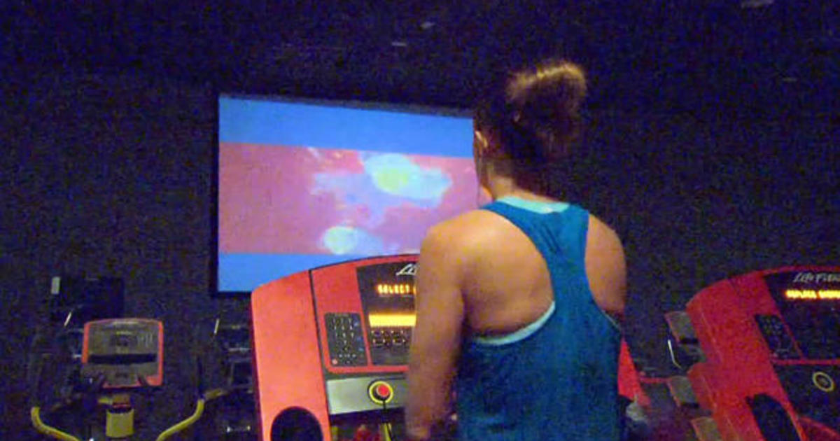Put down the popcorn, hop on the treadmill at "cardio theater"