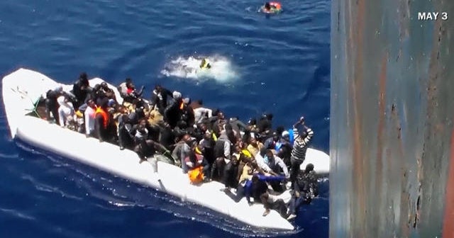 Libyan migrants rescued from sinking boats off Italian coast