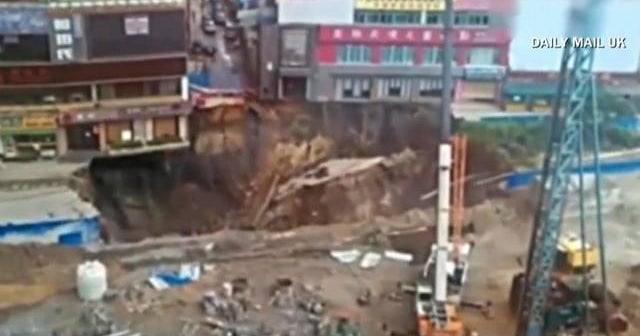 Caught on camera: Huge sinkhole opens