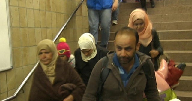 Europe opens its doors to thousands of migrants