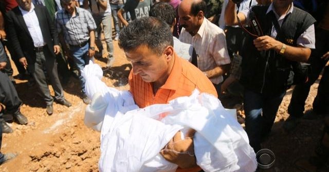 World watches as iconic Syrian migrant boy laid to rest