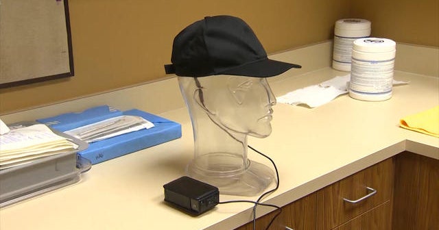Could laser-light baseball cap help regrow hair?