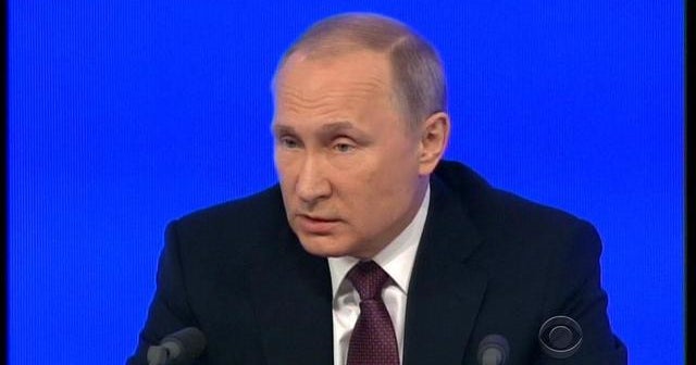Putin holds off retaliation over ouster of Russian diplomats