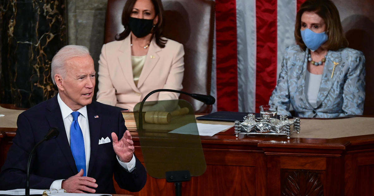 Biden declares "it's good to be back" in speech that highlights ambitious plans