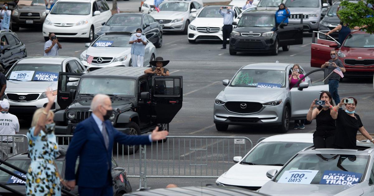 Biden holds car rally in to mark 100 days in office CBS News