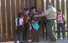 Asylum seekers enter the United States along the Arizona border 