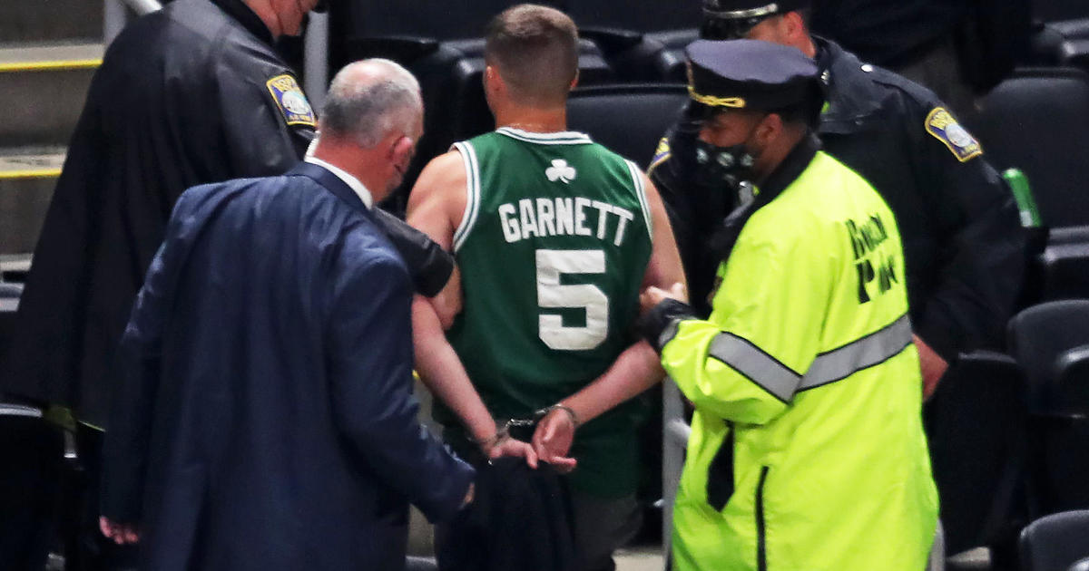 Why a fan was charged with assault for allegedly throwing a water bottle at Kyrie Irving