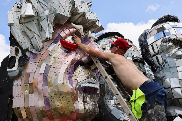Mount Recyclemore" sculpture to stare down Biden and other G7 leaders in U.K., demanding they tackle e-waste - CBS News