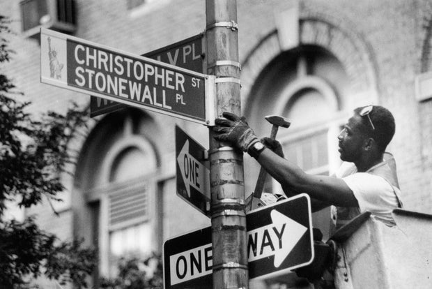 NYC street sign commemorating Stonewall uprising installed in 1989