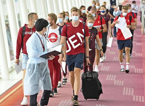 Members of the Danish Olympic rowing team arrive at Tokyo's Haneda airport ahead of the Tokyo Olympics