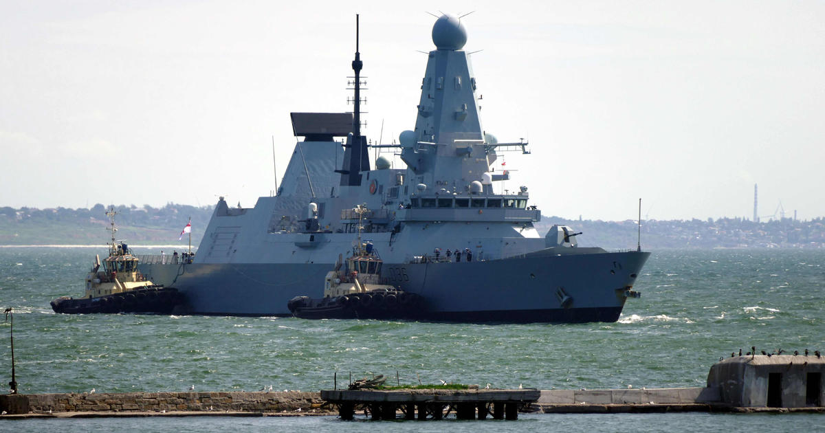 U.K. rejects Russia's claim to have fired "warning shots" at a British warship off Crimea's coast