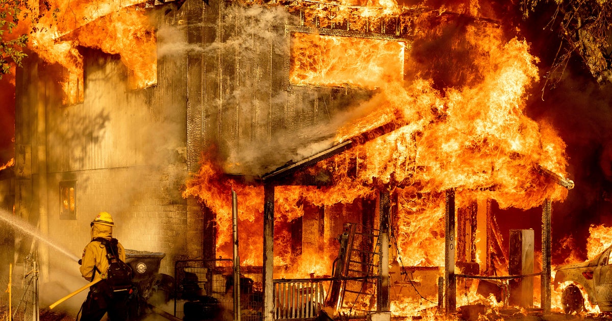 Extreme heat-fueled wildfires rage in the West, squeezing California's power supply