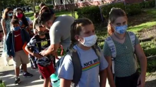 cbsn-fusion-school-mask-debate-rages-on-in-florida-as-covid-cases-surge-thumbnail-769772-640x360.jpg 