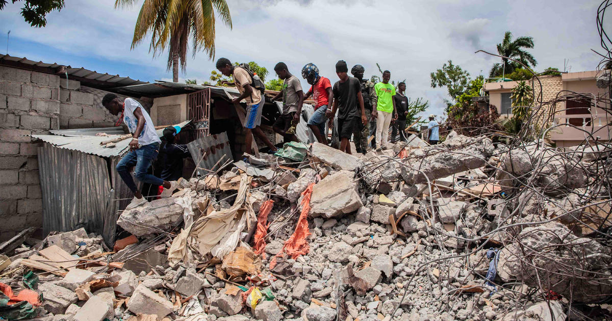 More than 1,400 dead in Haiti earthquake as severe weather looms