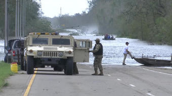 Search crews "trying to save lives" in Louisiana after hurricane 