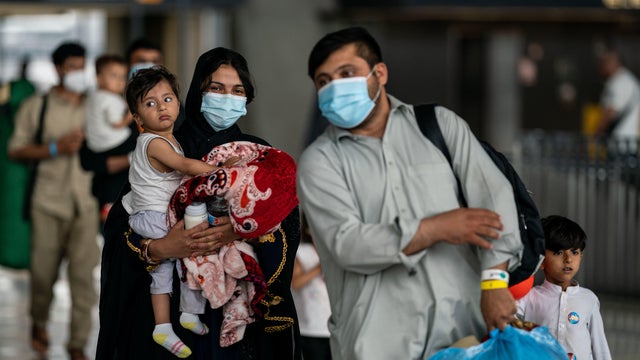 Afghanistan Refugees Arrive at Dulles International Airport 