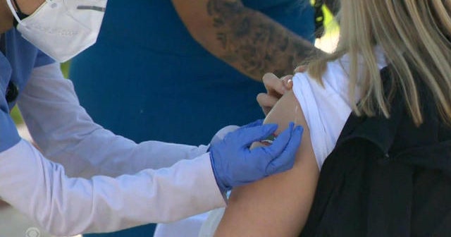 Debate over COVID-19 booster shots continue as U.S. reports decline in new infections