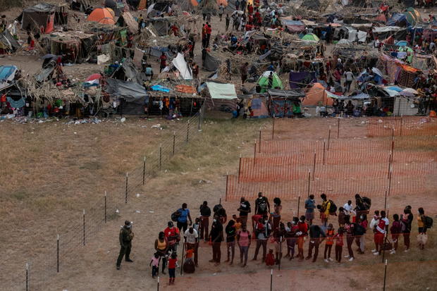 Migrants shelter near International Bridge in Del Rio, Texas 