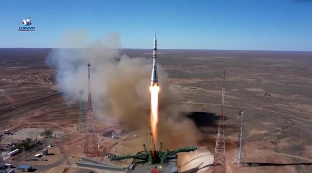 The Soyuz MS-19 spacecraft carrying ISS crew blasts off from the launchpad at the Baikonur Cosmodrome
