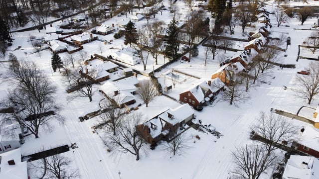 Aerial view of snow-covered neighborhood in Dayton 