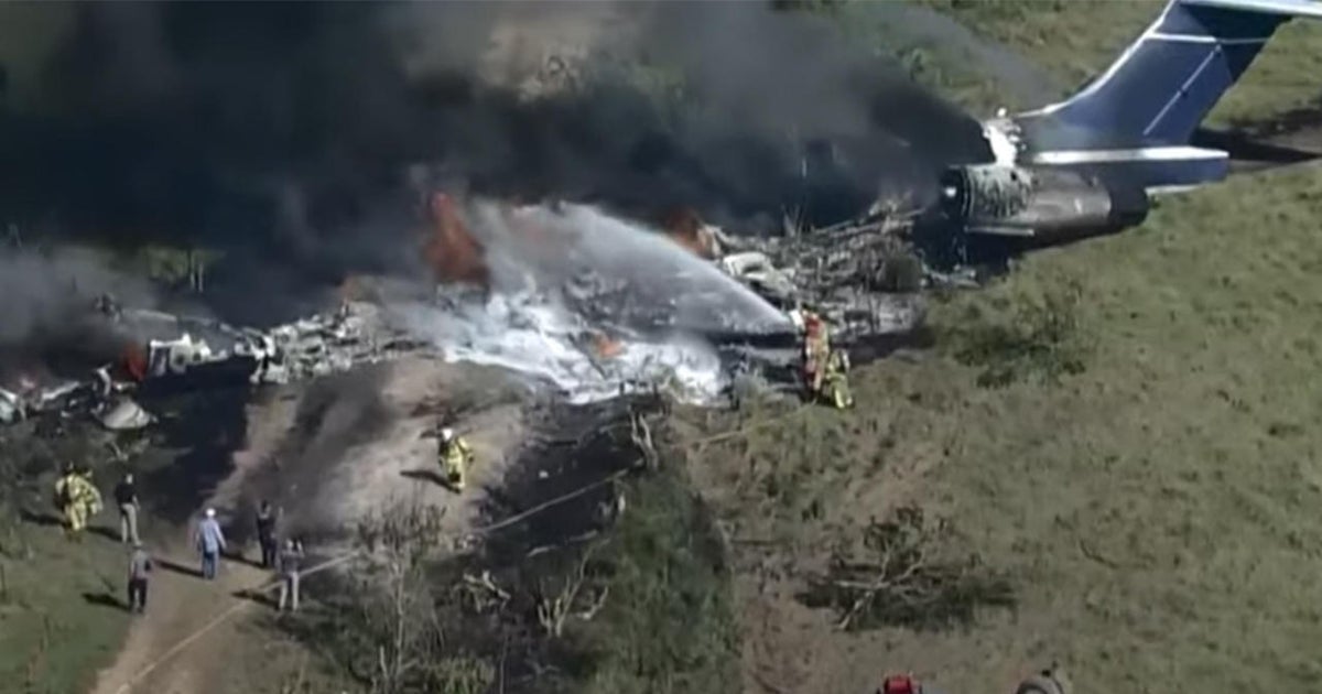 Plane with 21 on board runs off runway and catches fire while attempting to take off near Houston