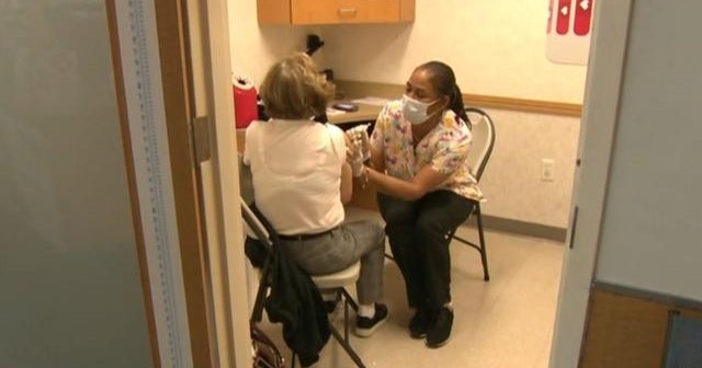 Several states expand COVID booster access to all adults
