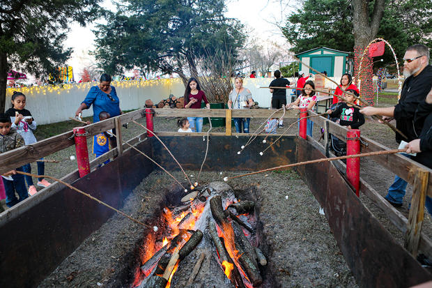 Christmas in the Park - roasting marshmallows on the yule log 
