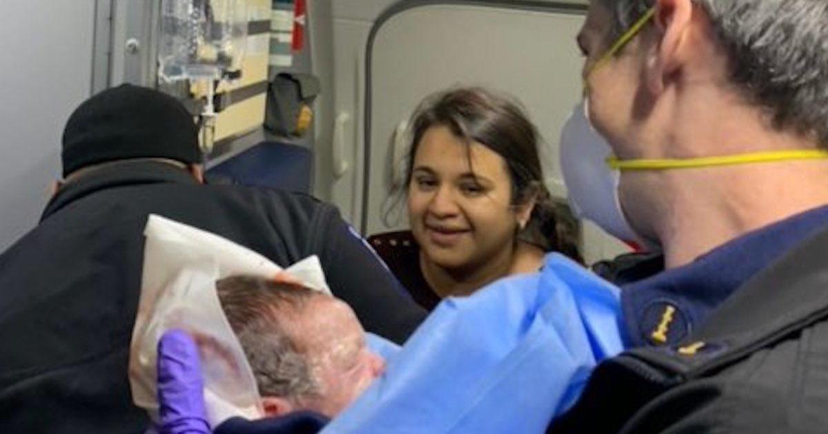Woman reunites with first responders who helped her deliver her baby on a plane