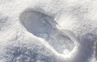 Shallow boot print in the snow 
