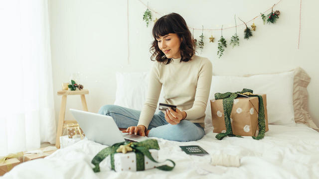 Woman doing online christmas shopping 