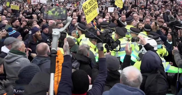 Omicron wreaks havoc in U.K. amid unrest over COVID-19 restrictions