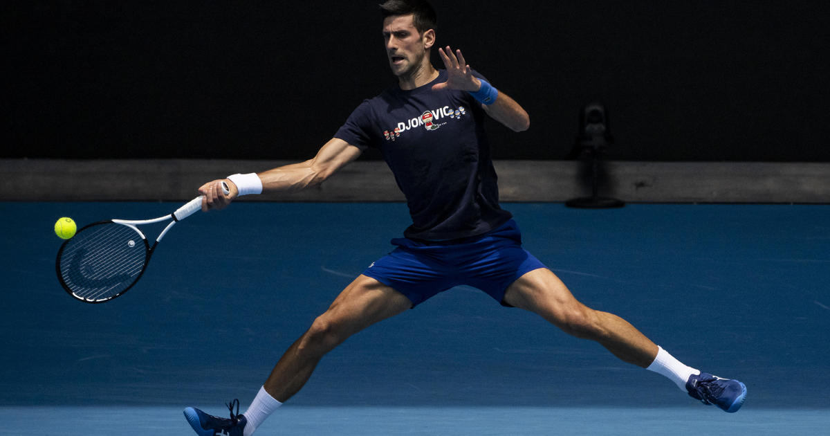 Still in limbo in Australia, Djokovic tries to clear up "misinformation" about his COVID status and activities before he arrived
