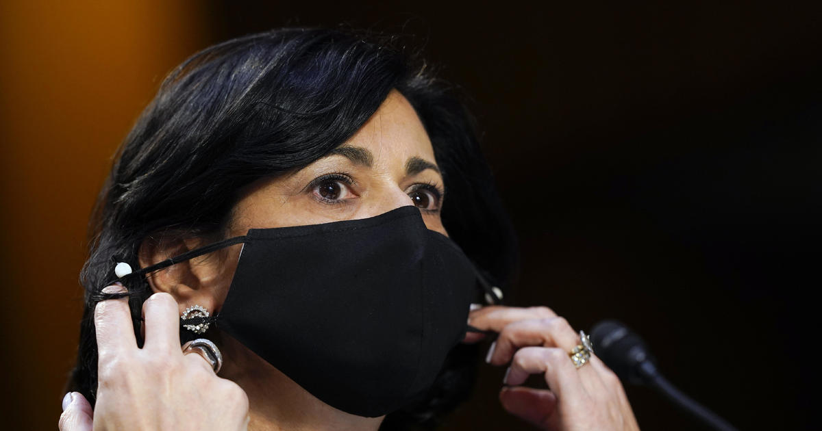Why some of Biden's top doctors are wearing masks in "low" COVID areas