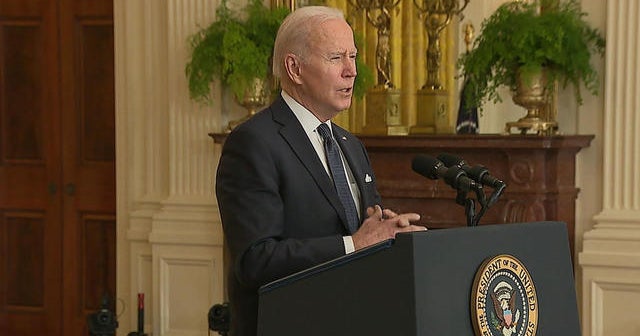 Biden says Russian invasion of Ukraine still distinctly possible, warns of risk to U.S. economy