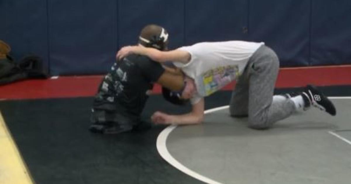 Born without legs, Adonis Lattimore wins state wrestling championship in Virginia