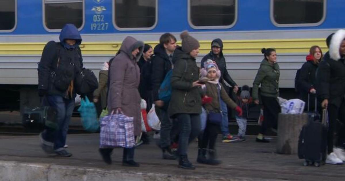 As hundreds of thousands of Ukrainians flee, many choose to stay behind: "This is our country, not Russia's"