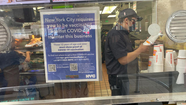 Vaccine Mandate sign at Burger King Fast food restaurant, Queens, New York 