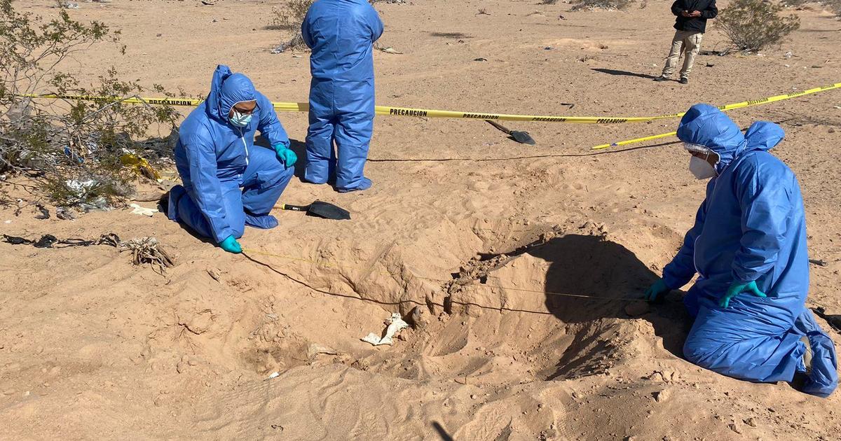 Mexico finds bodies of 9 men and 2 women in secret burial pits near U.S. border