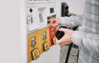 Man Purchases Gas at Pump 