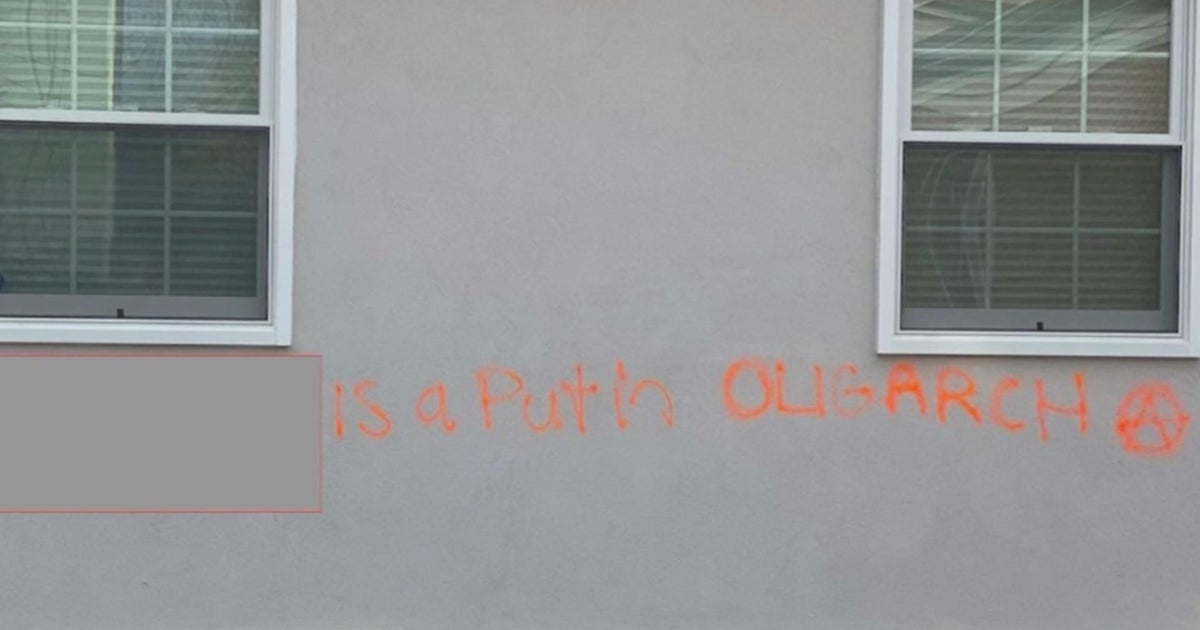 Long Island business owners say vandal with anti-Putin messages is mistakenly targeting their building