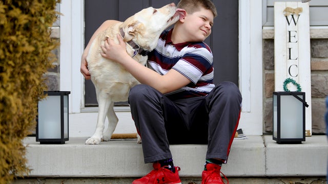 Photo of Nolan Balcitis with his dog 