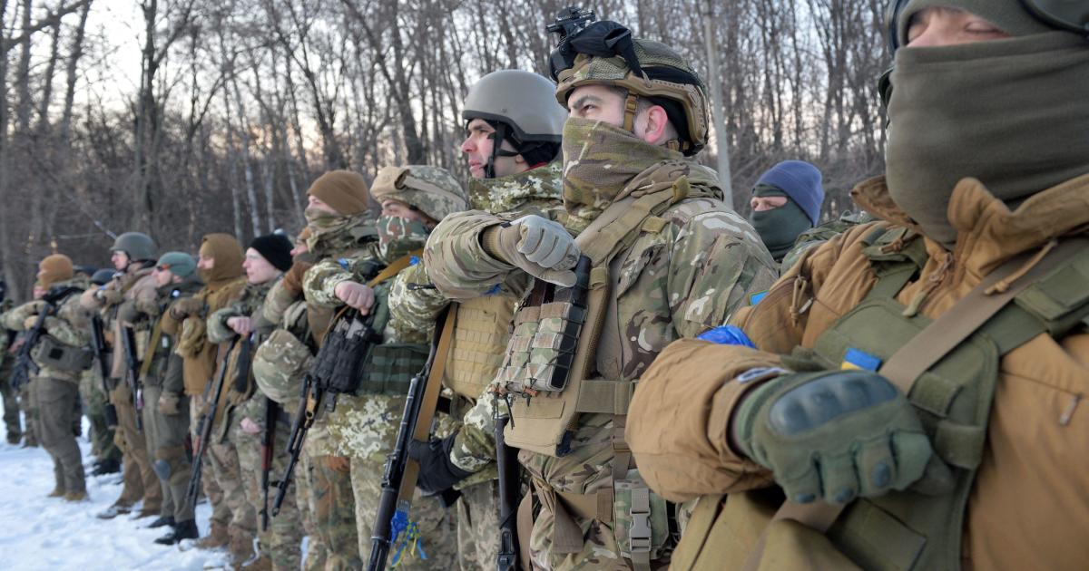 The Azov Battalion: How Putin built a false premise for a war against  "Nazis" in Ukraine - CBS News