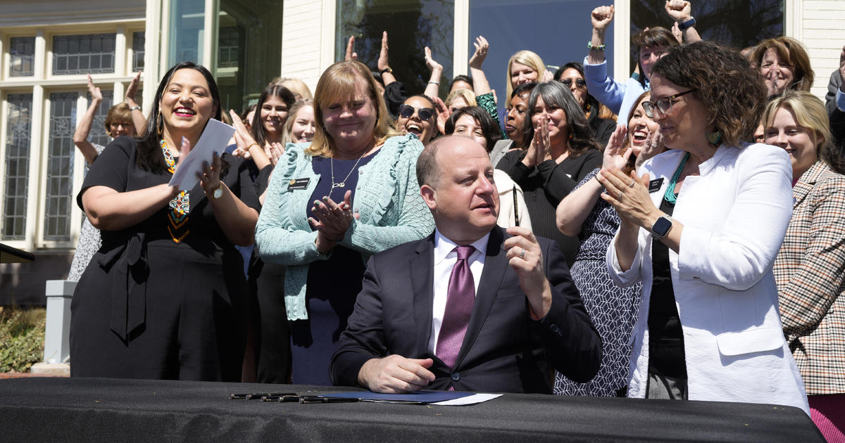 Colorado governor signs bill codifying the right to abortion in state law