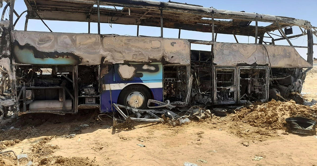 Tourist bus collides with truck in Egypt and bursts into flames, killing 10 people